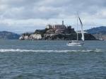 Alcatraz Island with a passing sailboar